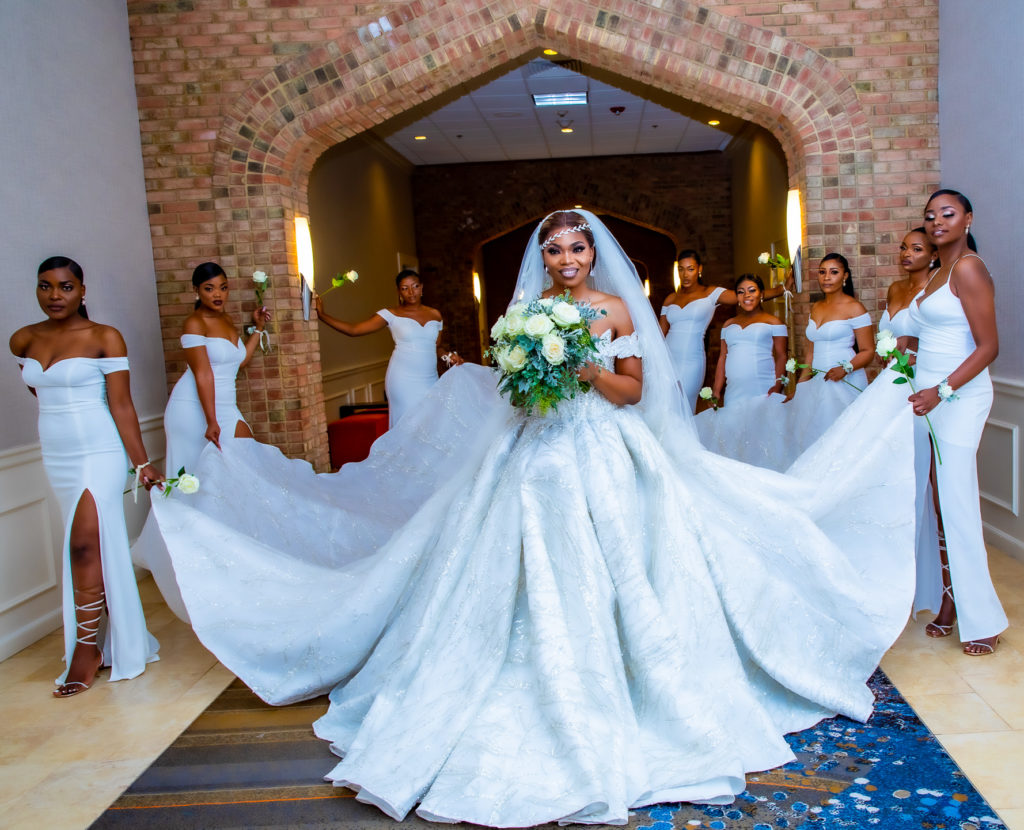 Congolese bride and bridesmaids taking wedding portrait at the Radisson hotel in Nashua, NH