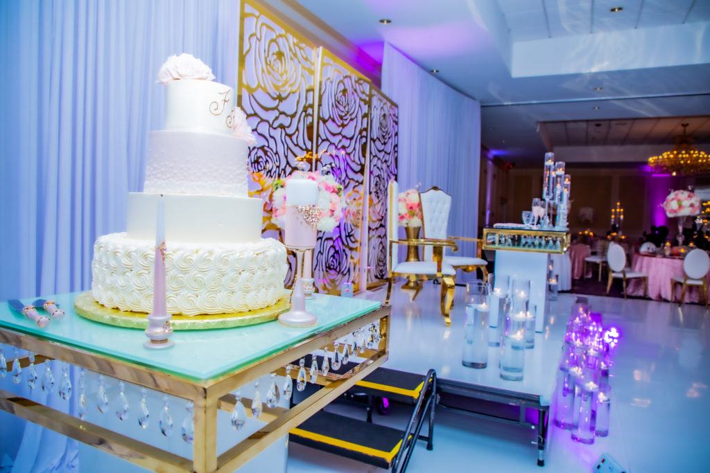 Wedding cake and blush decor at an African wedding in Nashua, NH